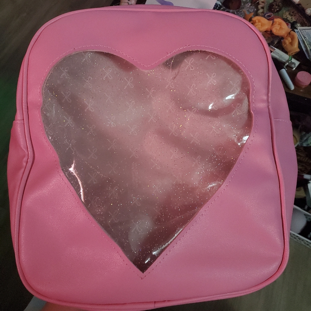 Pink Backpack with Heart shaped glitter window